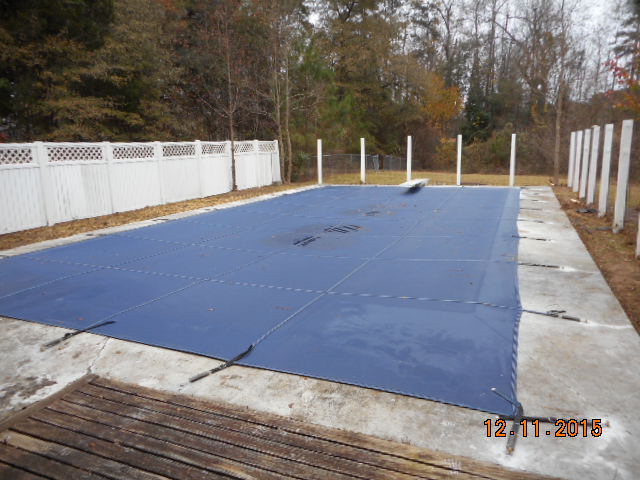 7331 Quail Run Road Lizella, GA 31052 - Photo 4 of 23 a view of a house with a roof deck