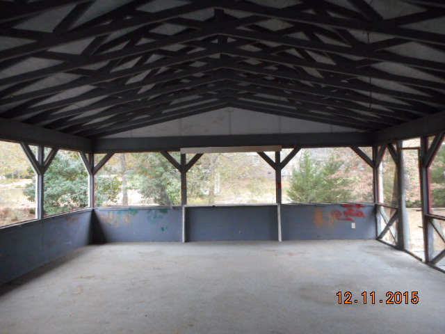 7331 Quail Run Road Lizella, GA 31052 - Photo 6 of 23 an empty room with large windows