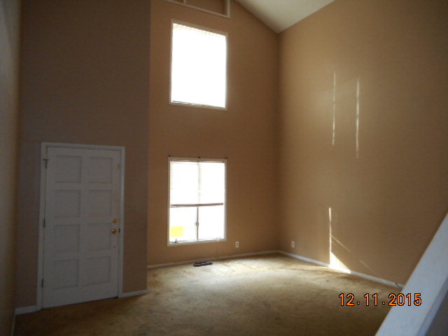 7331 Quail Run Road Lizella, GA 31052 - Photo 8 of 23 an empty room with windows