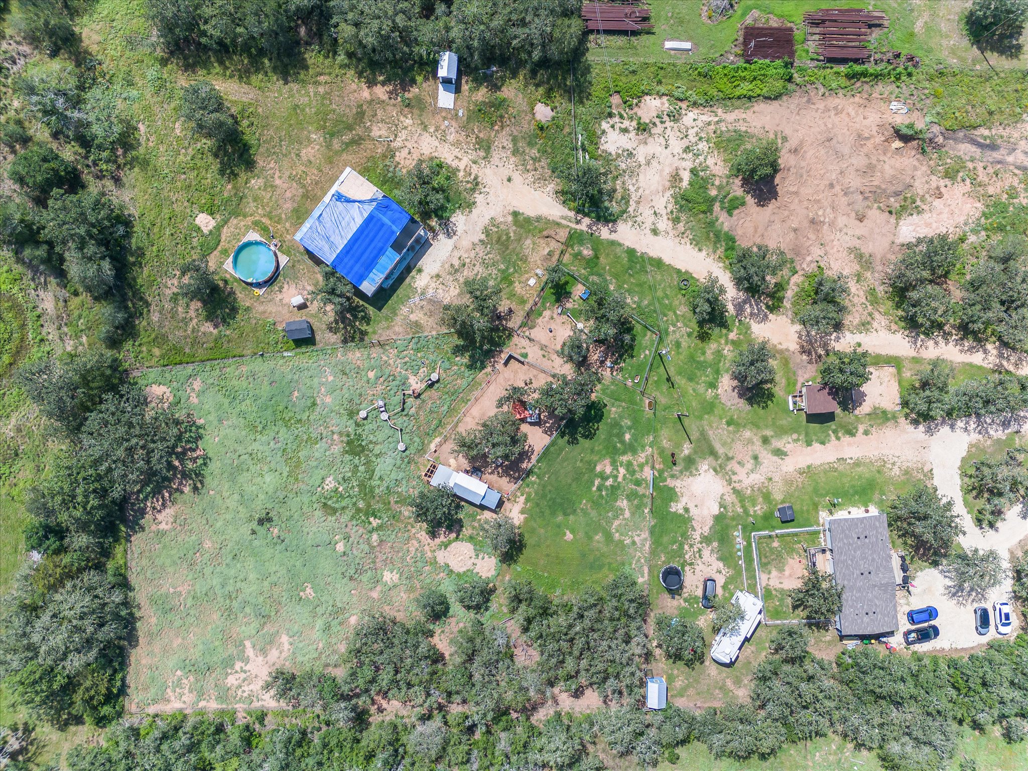 2755 Washburn Road Luling, TX 78648 - Photo 35 of 40 An aerial perspective reveals a secluded property with ample acreage for diverse outdoor pursuits.