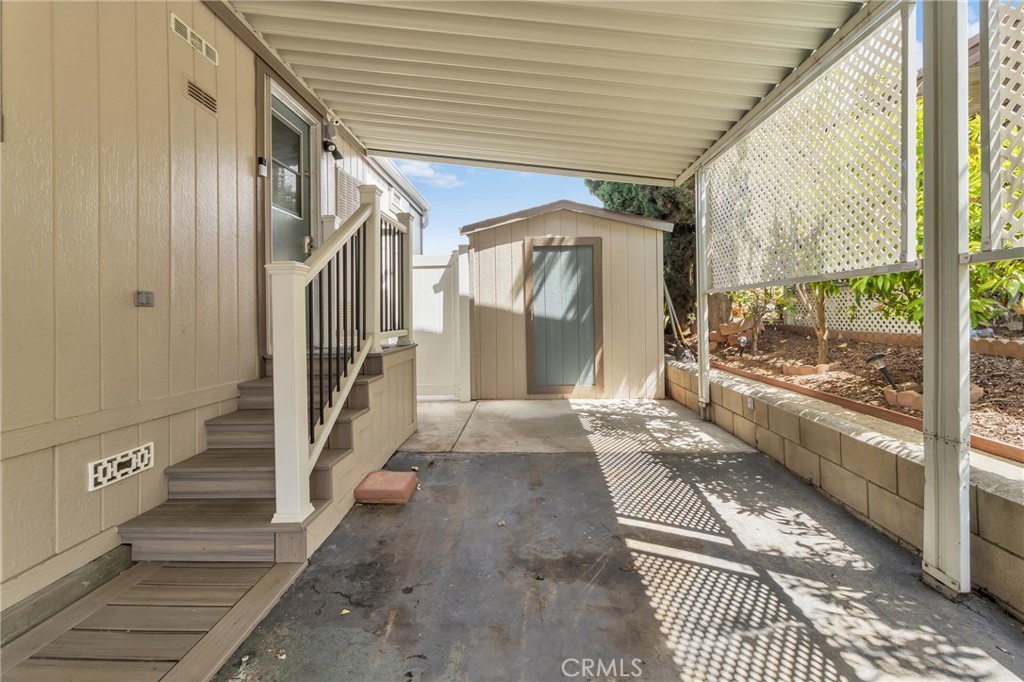 971 Borden Road, Unit 109 San Marcos, CA 92069 - Photo 3 of 31 Attached Carport with Shed