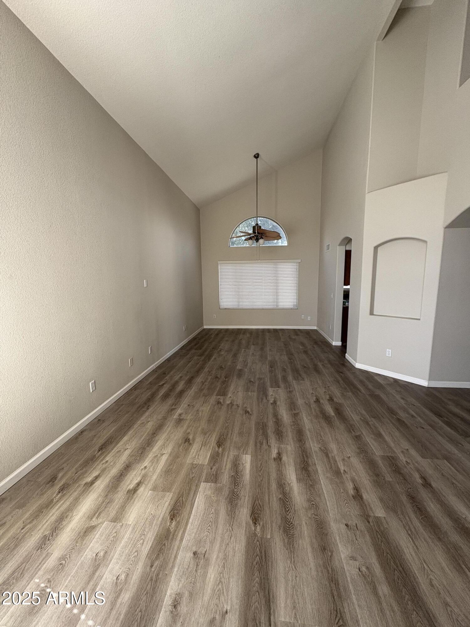 1472 East Constitution Drive Chandler, AZ 85225 - Photo 9 of 27 a view of empty room with wooden floor
