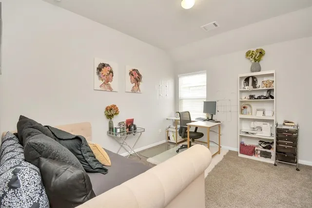 a bathroom with a sink vanity and a mirror