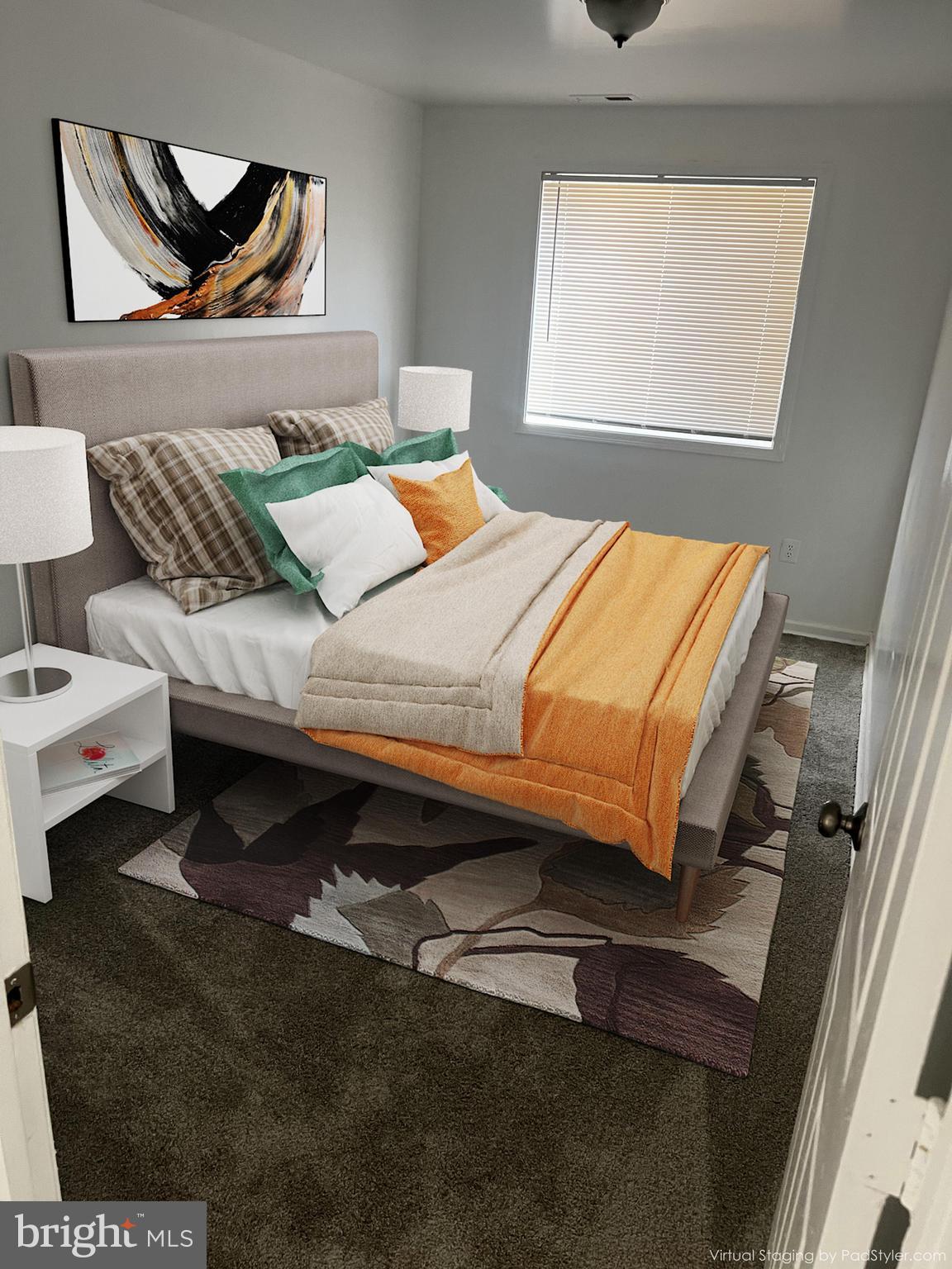 330 37th Street Southeast, Unit T2 Washington, DC 20019 - Photo 4 of 9 a bedroom with a bed and window