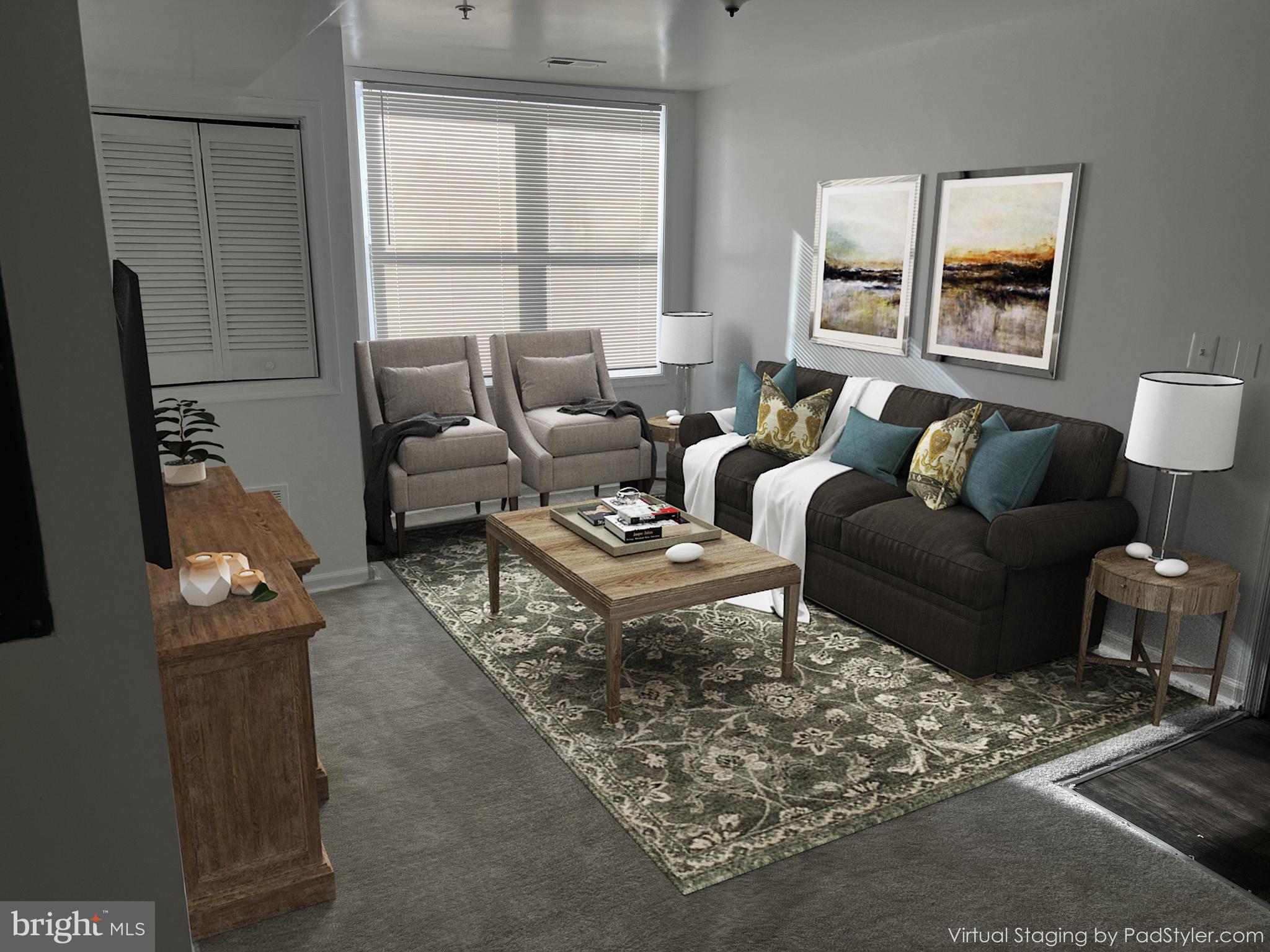 330 37th Street Southeast, Unit T2 Washington, DC 20019 - Photo 7 of 9 a living room with furniture wooden floor and a large window