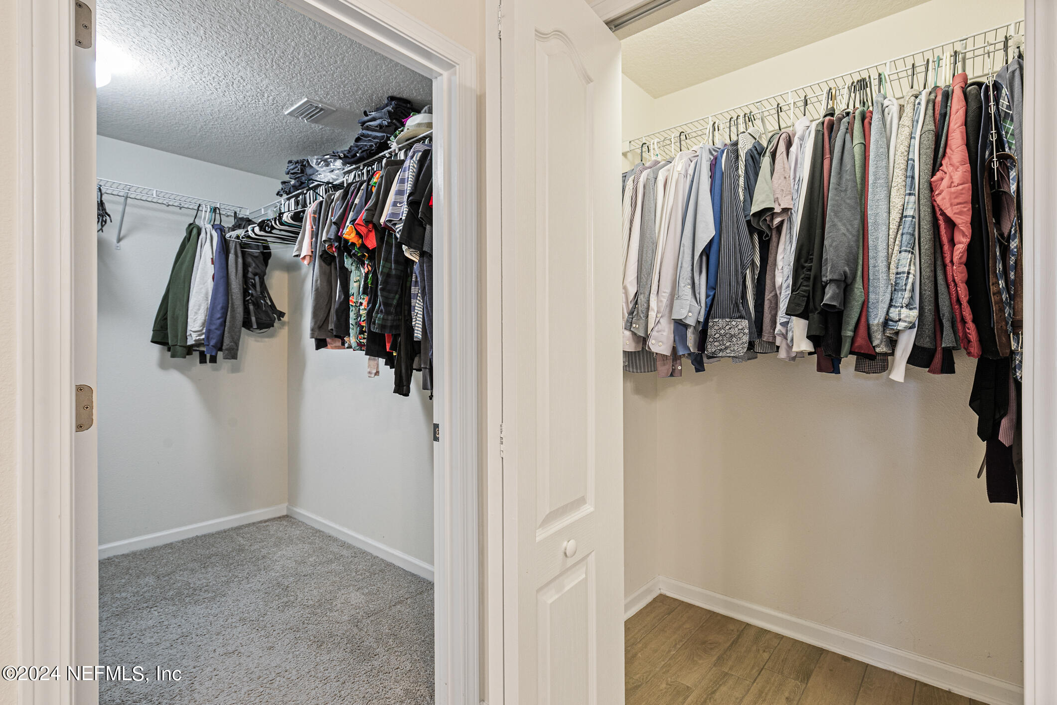 340 Chasewood Drive St. Augustine, FL 32095 - Photo 22 of 46 a view of walk in closet with clothes