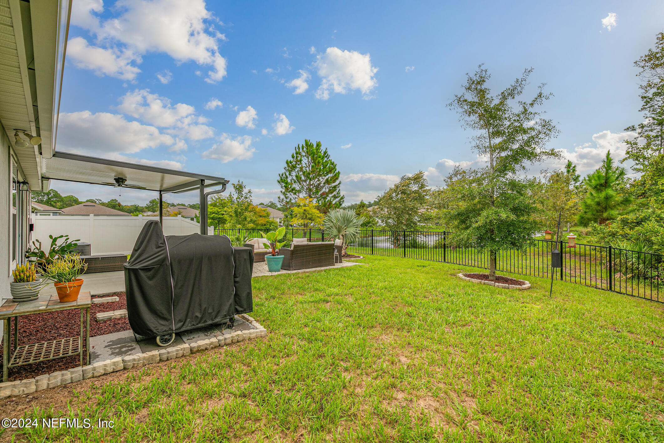 340 Chasewood Drive St. Augustine, FL 32095 - Photo 35 of 46 a view of a backyard