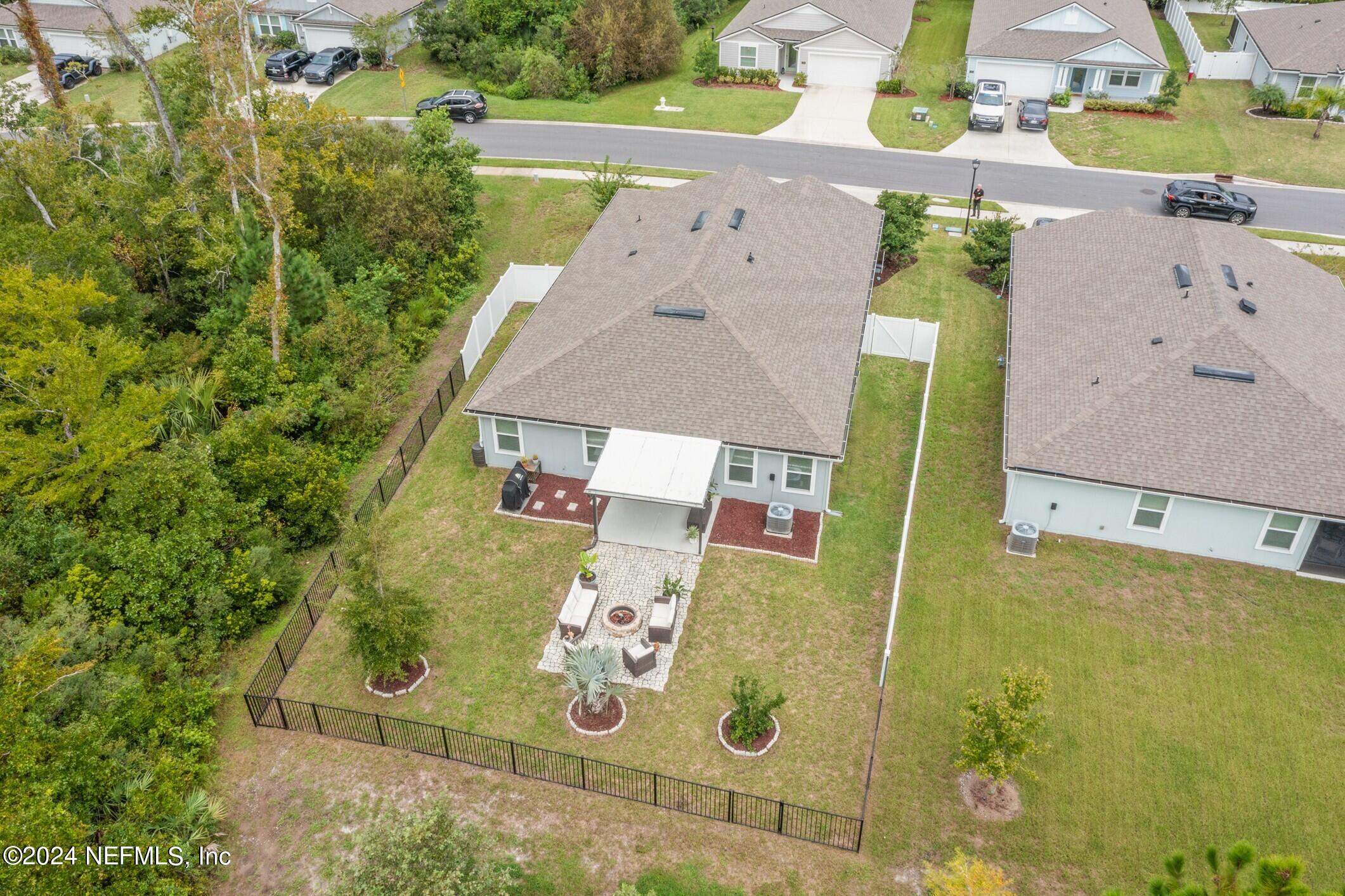340 Chasewood Drive St. Augustine, FL 32095 - Photo 41 of 46 an aerial view of a house with a swimming pool