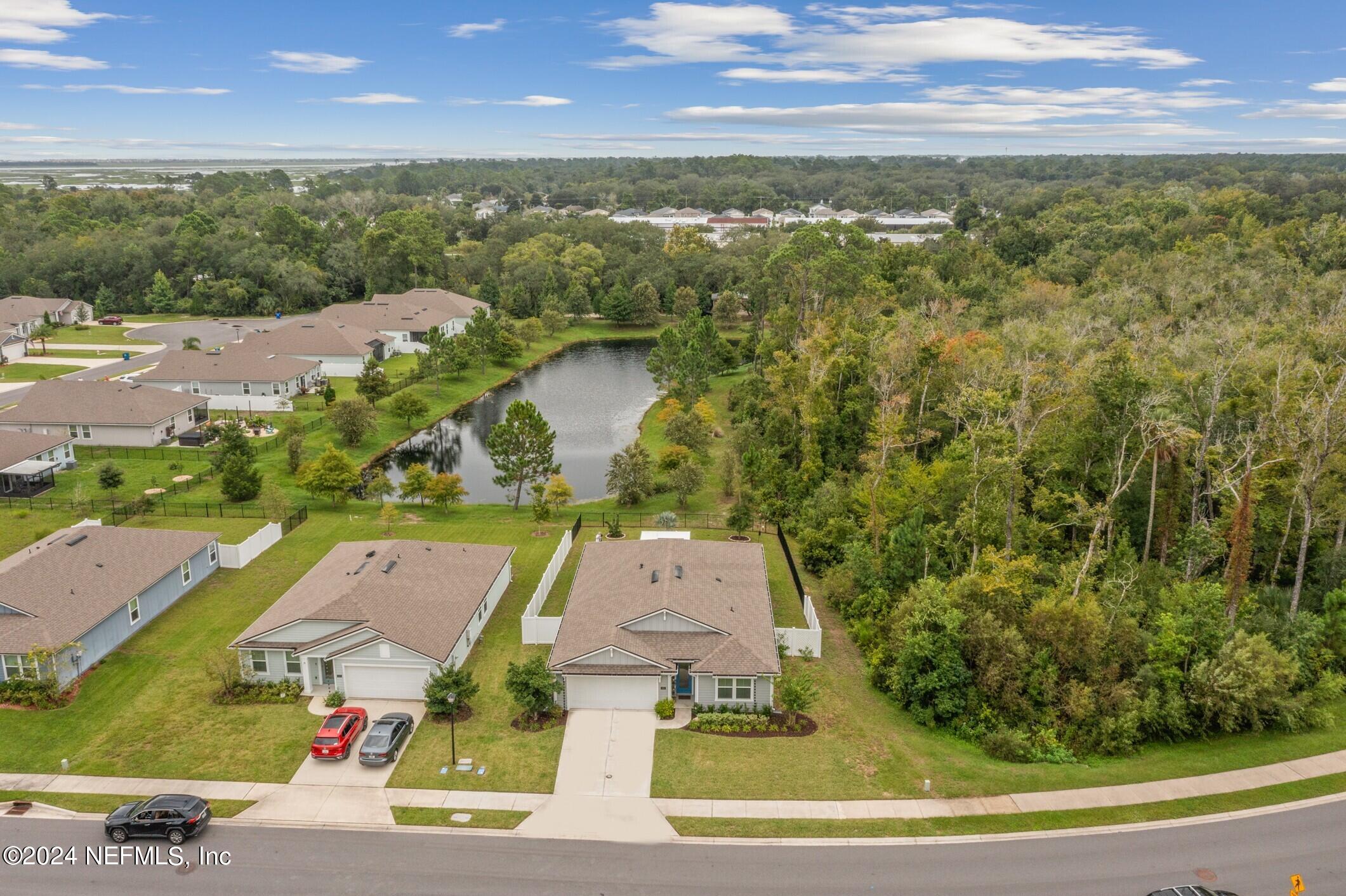 340 Chasewood Drive St. Augustine, FL 32095 - Photo 43 of 46 an aerial view of residential houses with outdoor space and ocean