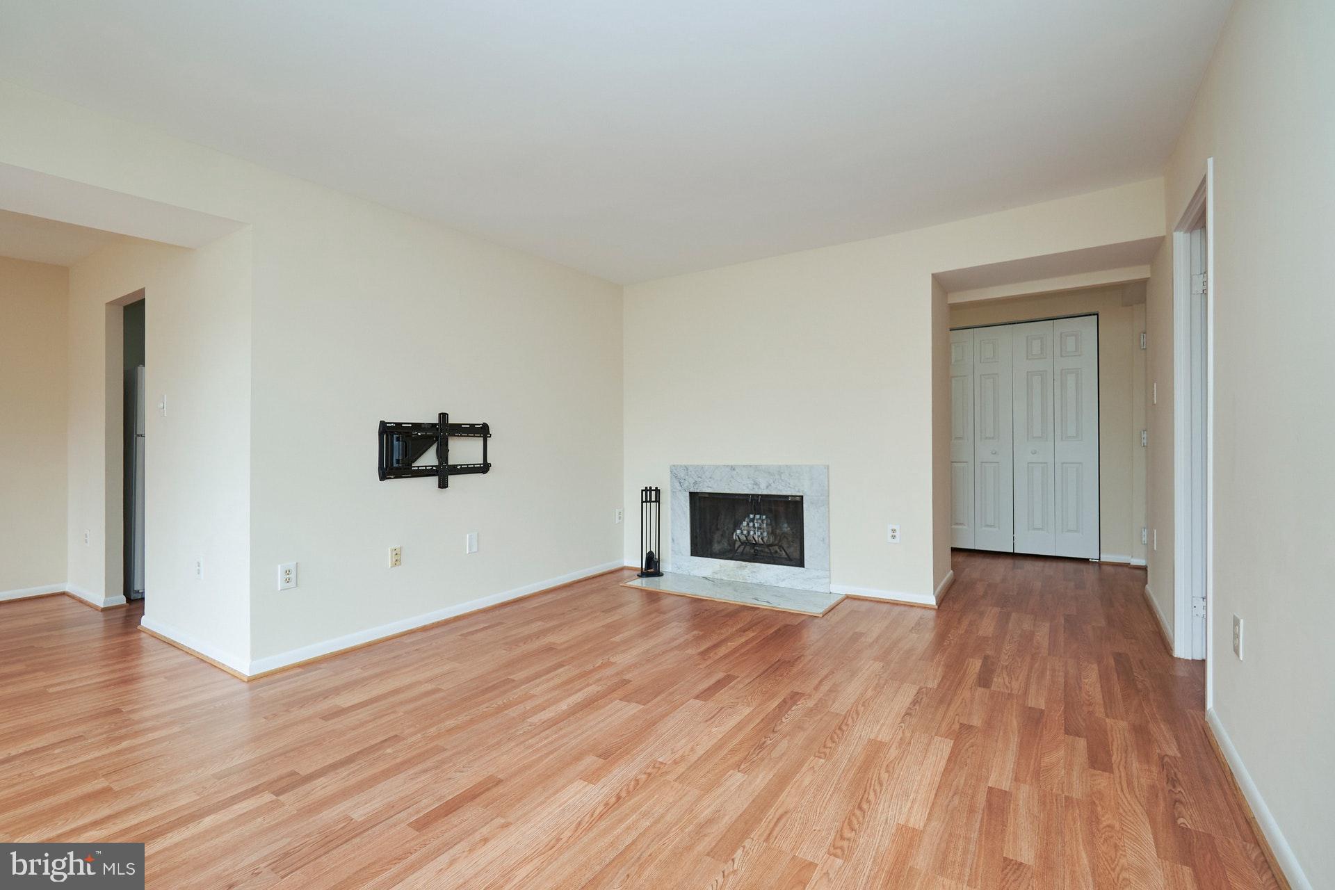 2212 Springwood Drive, Unit 206 Reston, VA 20191 - Photo 12 of 46 a view of empty room with wooden floor