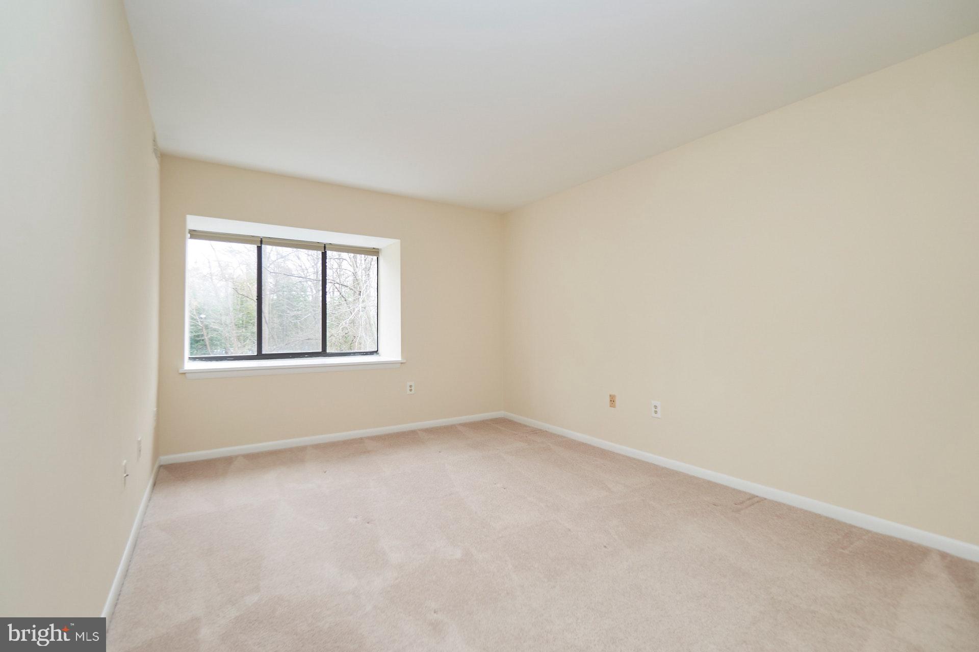 2212 Springwood Drive, Unit 206 Reston, VA 20191 - Photo 23 of 46 an empty room with a window
