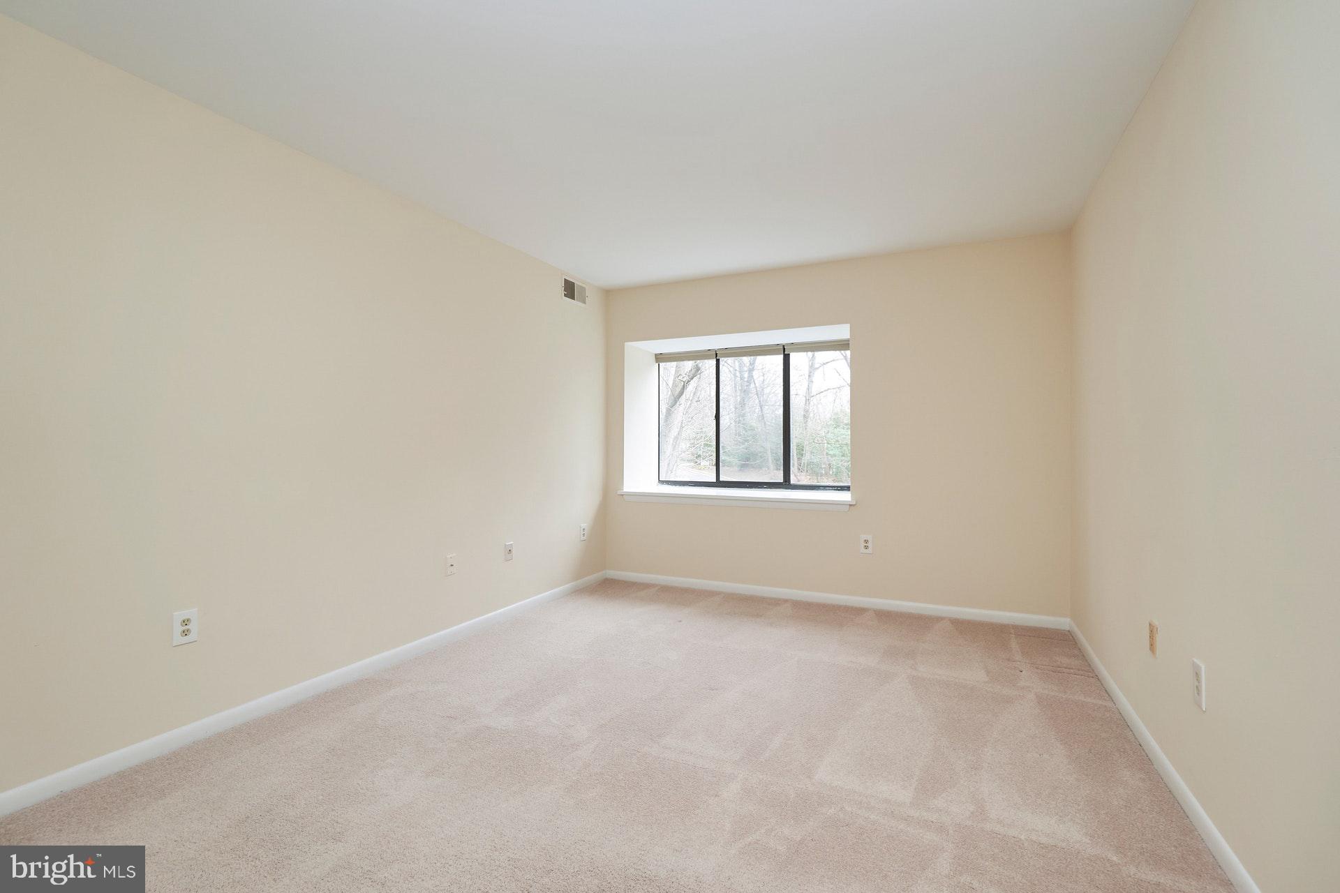 2212 Springwood Drive, Unit 206 Reston, VA 20191 - Photo 24 of 46 an empty room with windows