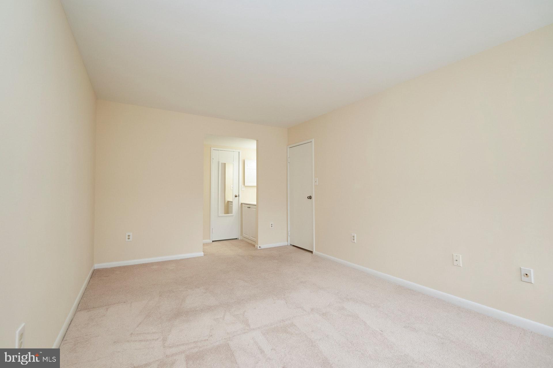 2212 Springwood Drive, Unit 206 Reston, VA 20191 - Photo 25 of 46 a view of an empty room and window