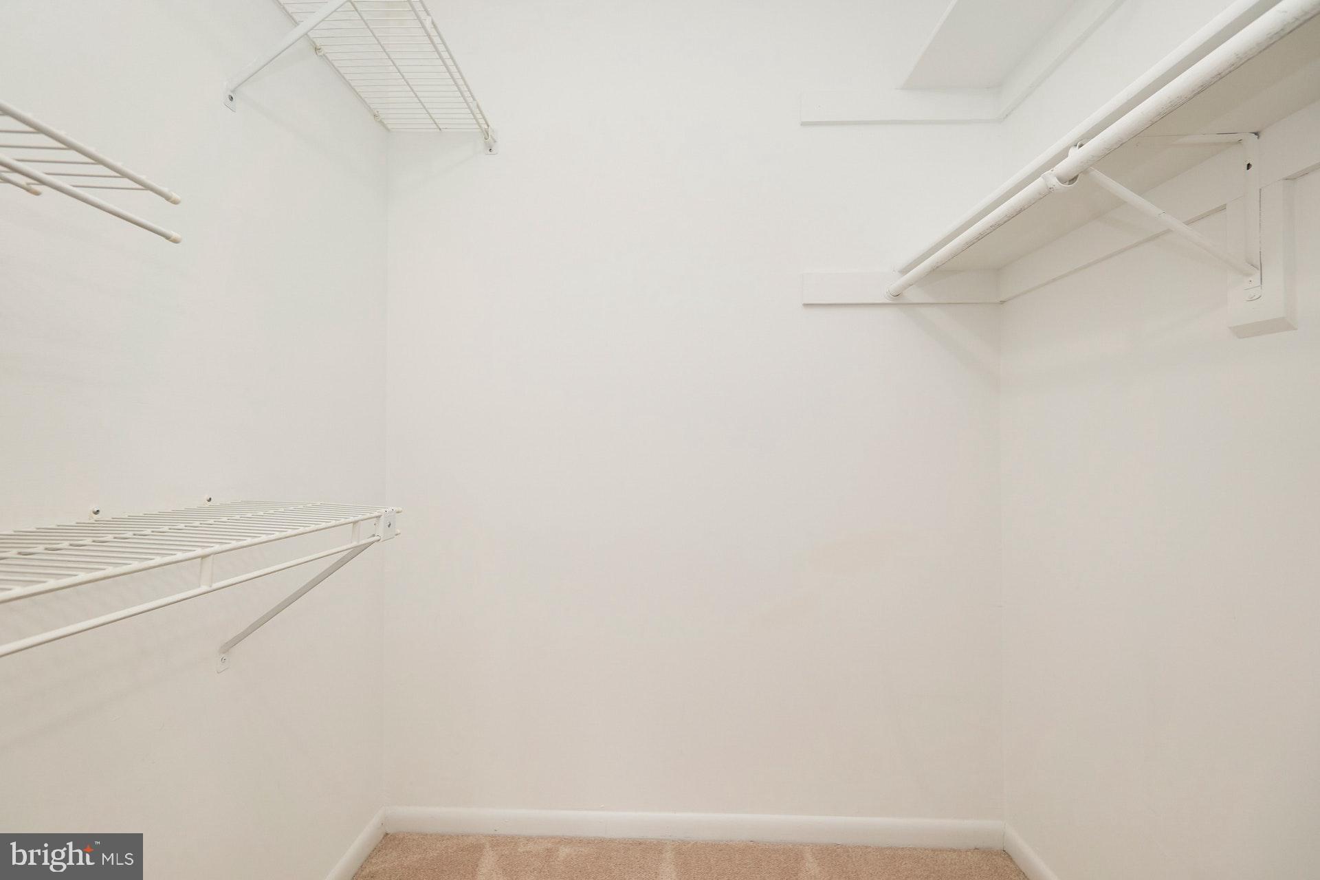 2212 Springwood Drive, Unit 206 Reston, VA 20191 - Photo 28 of 46 a view of small space with racks on the wall