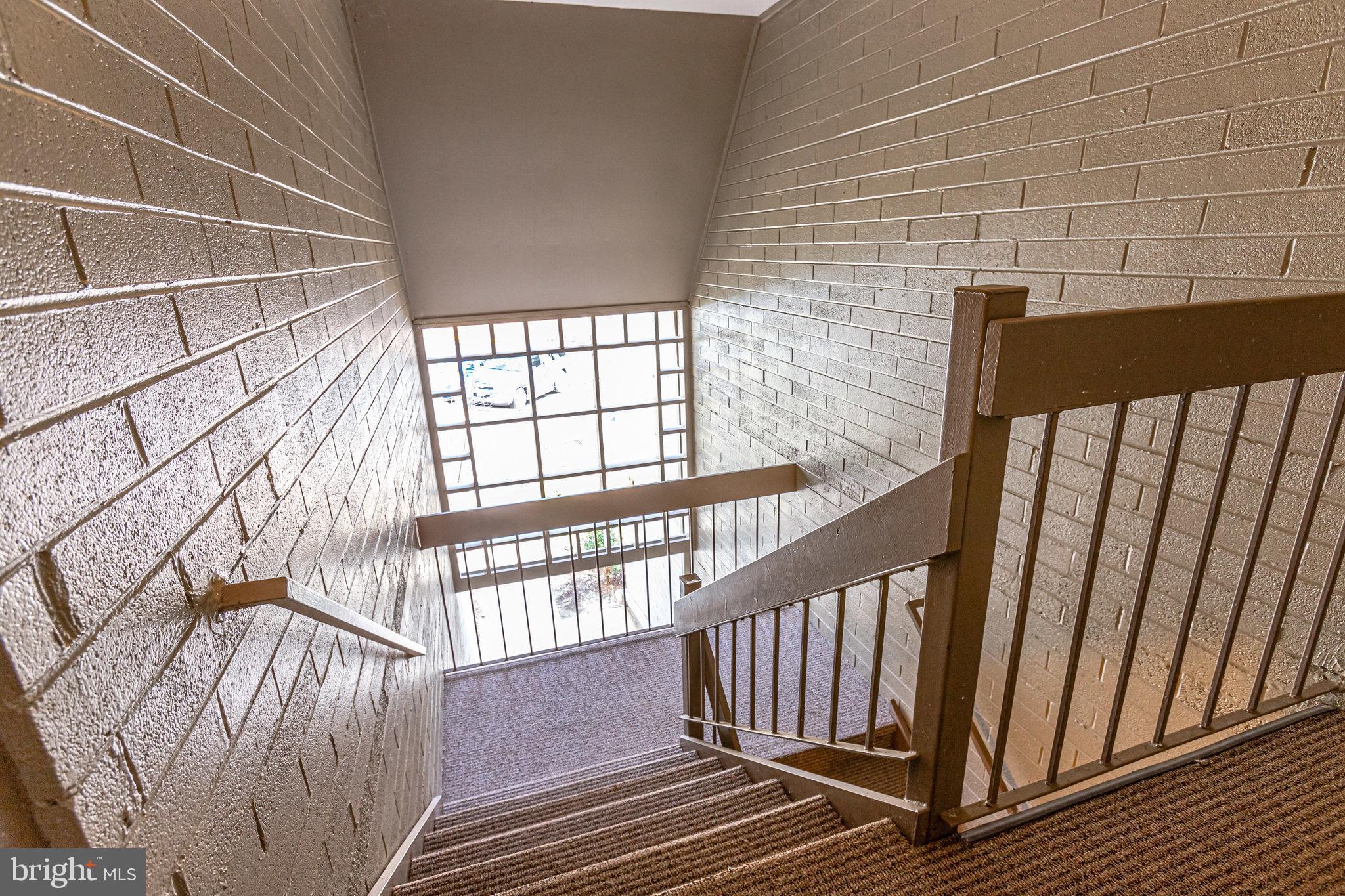 2212 Springwood Drive, Unit 206 Reston, VA 20191 - Photo 3 of 46 a view of entryway with wooden floor