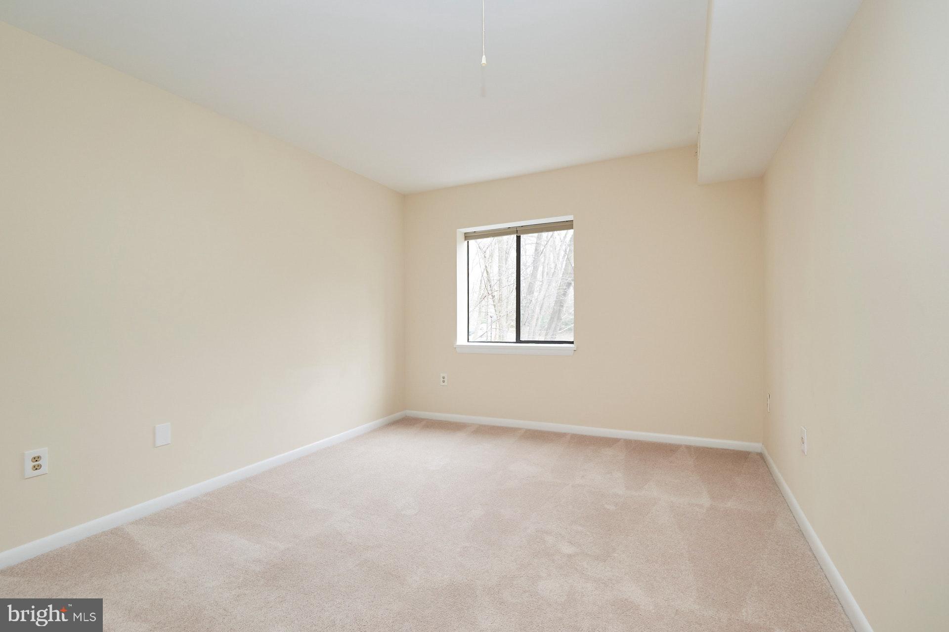 2212 Springwood Drive, Unit 206 Reston, VA 20191 - Photo 31 of 46 an empty room with a window