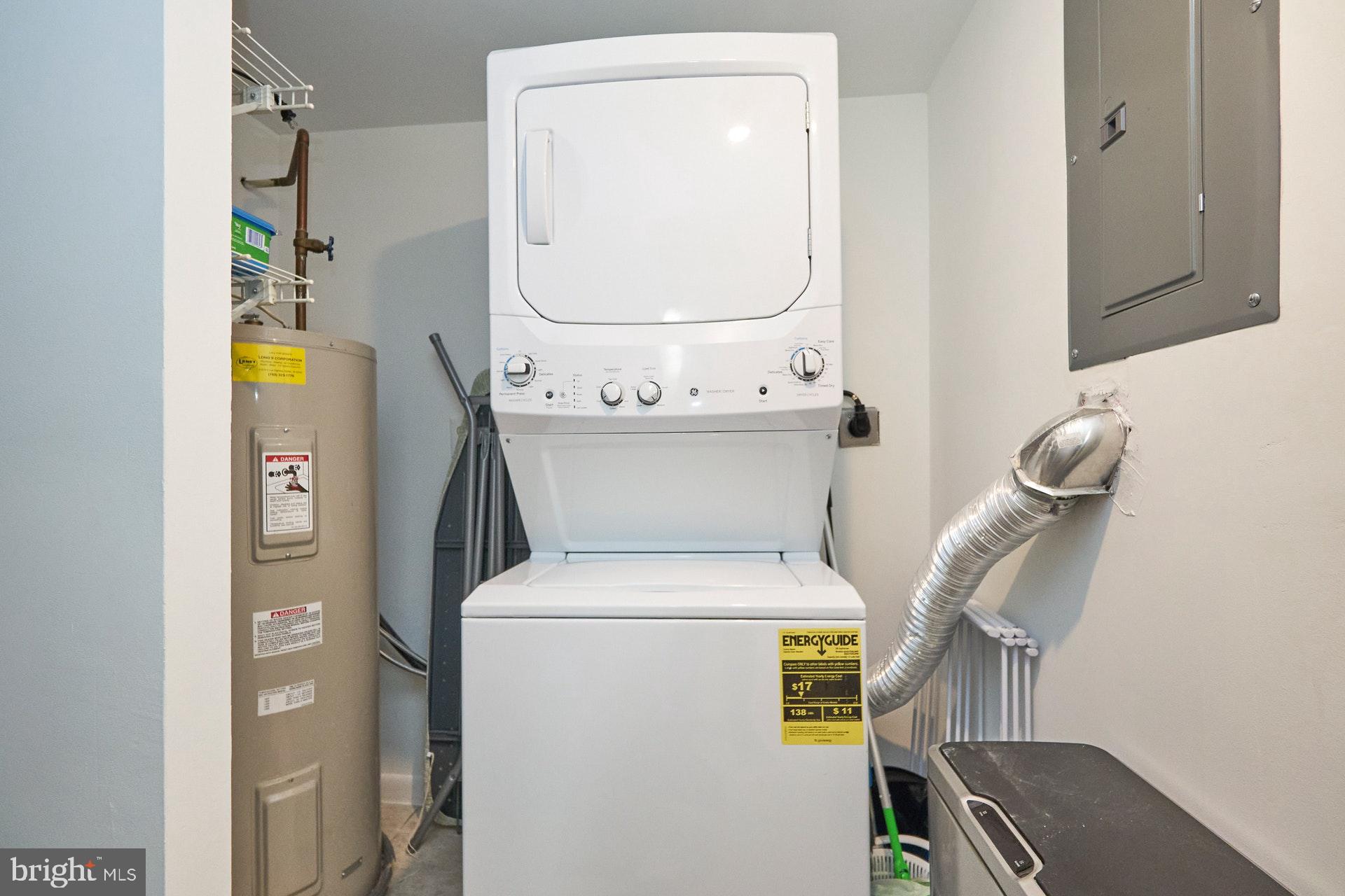 2212 Springwood Drive, Unit 206 Reston, VA 20191 - Photo 38 of 46 a utility room with dryer and washer