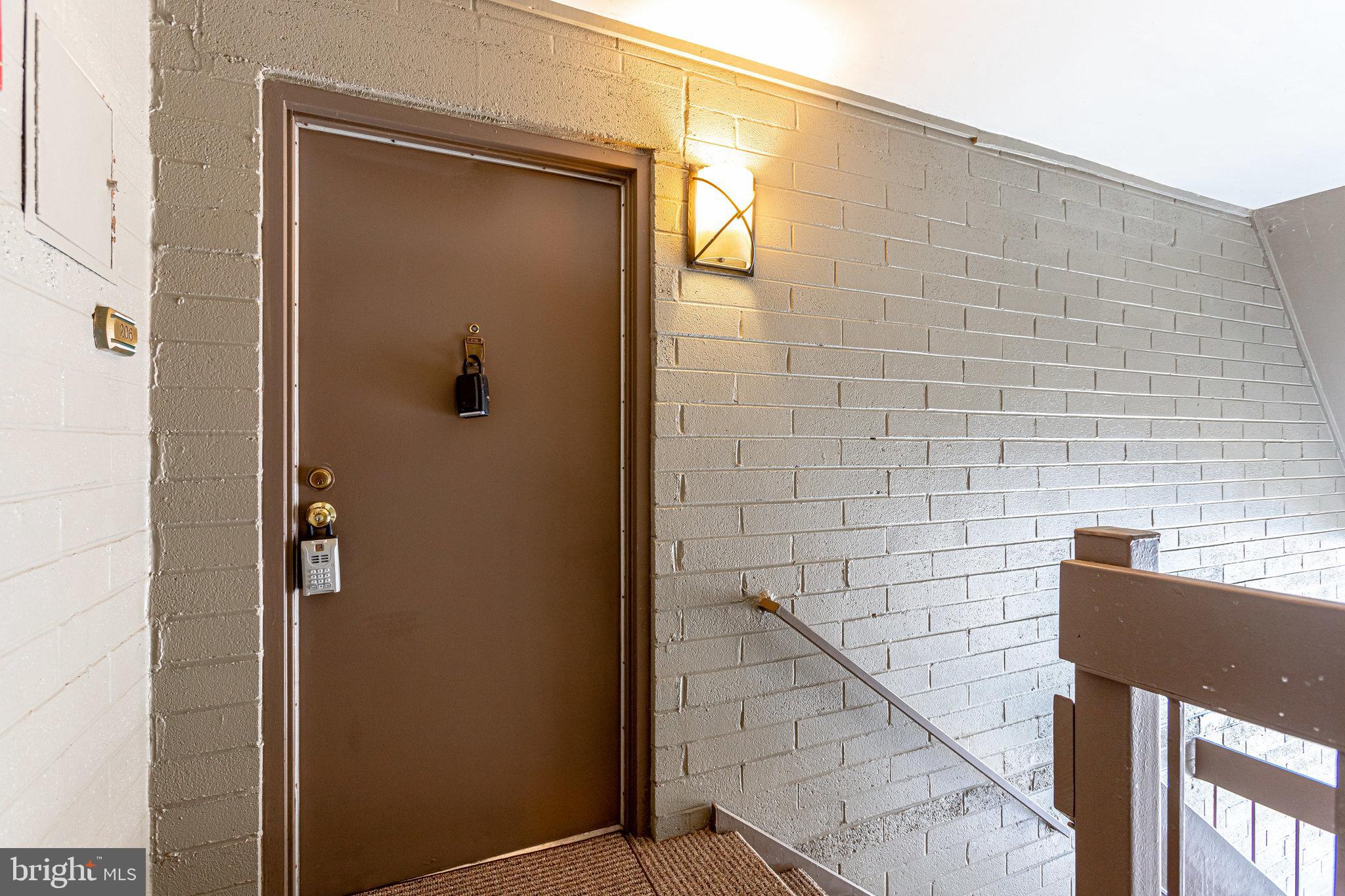 2212 Springwood Drive, Unit 206 Reston, VA 20191 - Photo 4 of 46 a bathroom with a shower