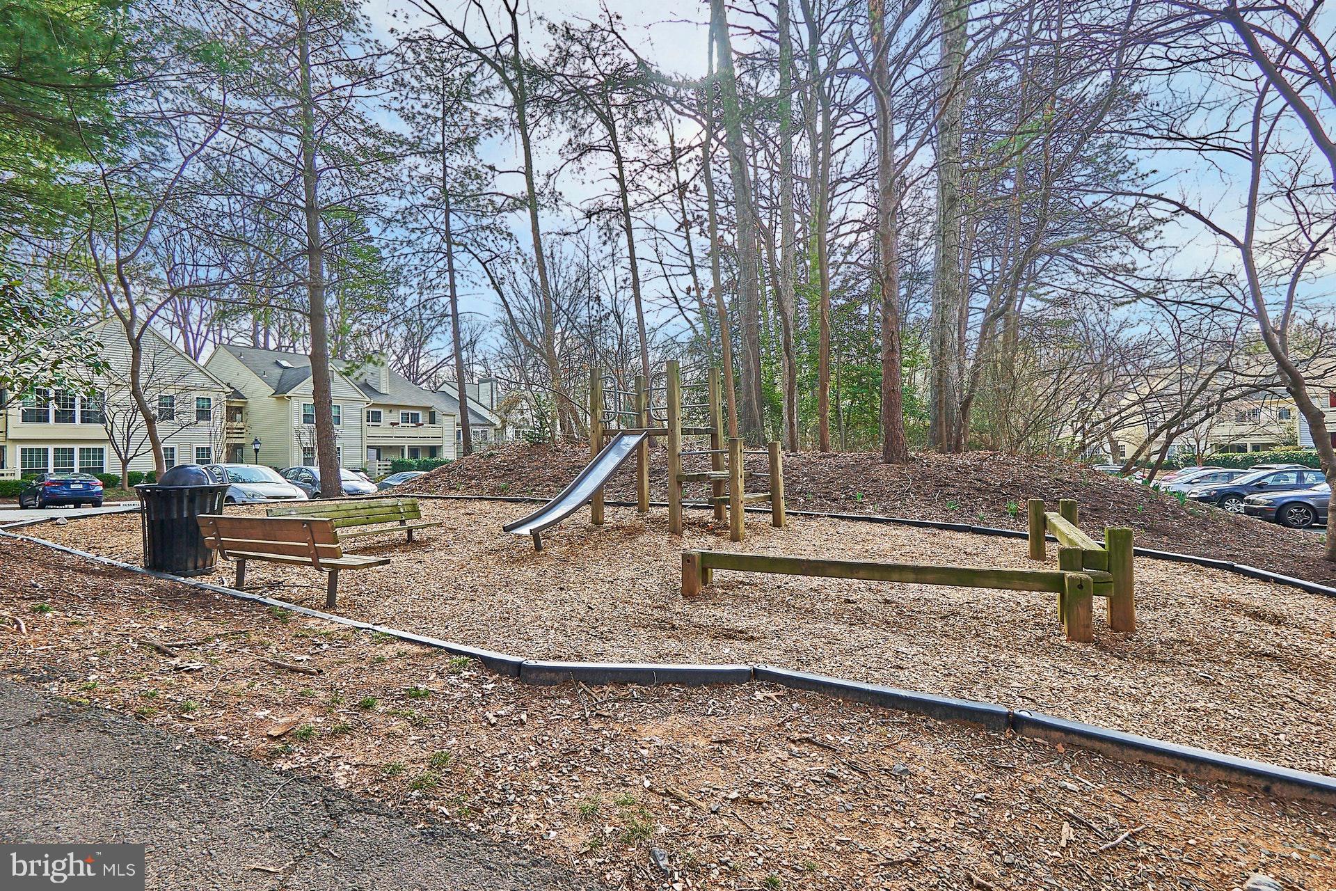 2212 Springwood Drive, Unit 206 Reston, VA 20191 - Photo 43 of 46 a view of a park with swings