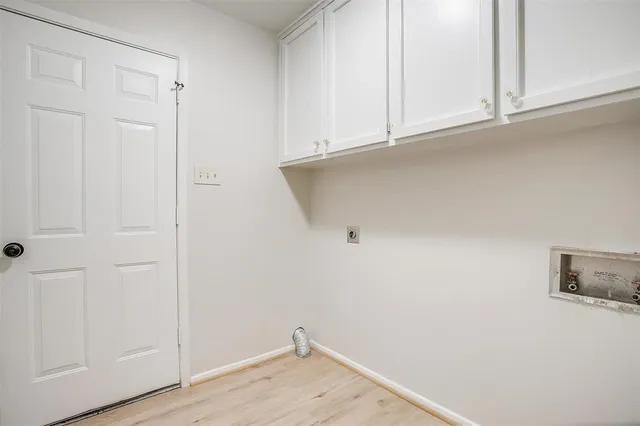 a view of outdoor space with wooden fence