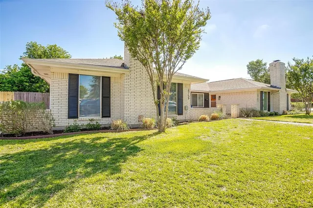 a view of a house with a patio