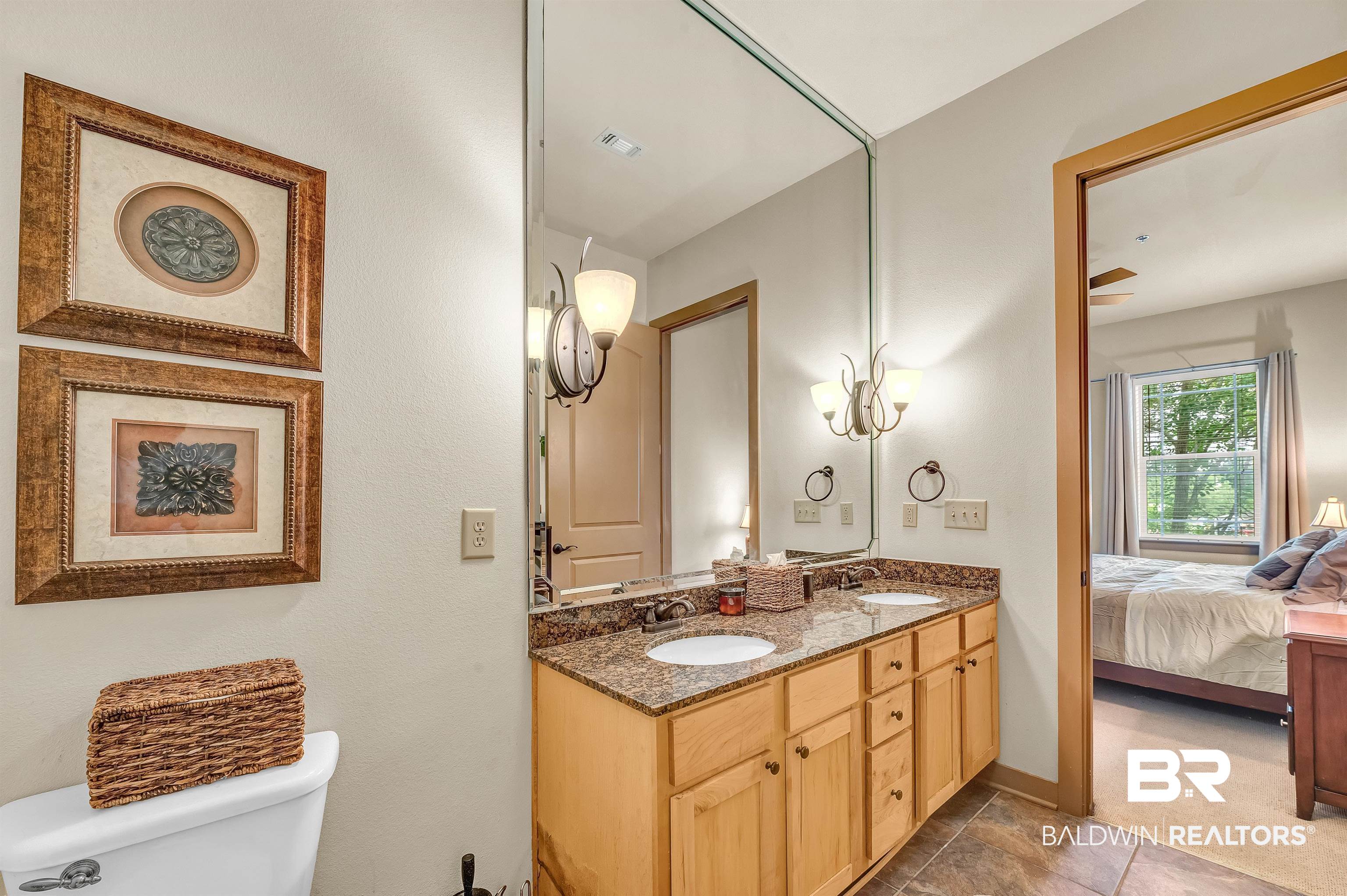 1430 Regency Road, Unit C201 Gulf Shores, AL 36542 - Photo 41 of 54 Full bathroom with double vanity and ensuite bath