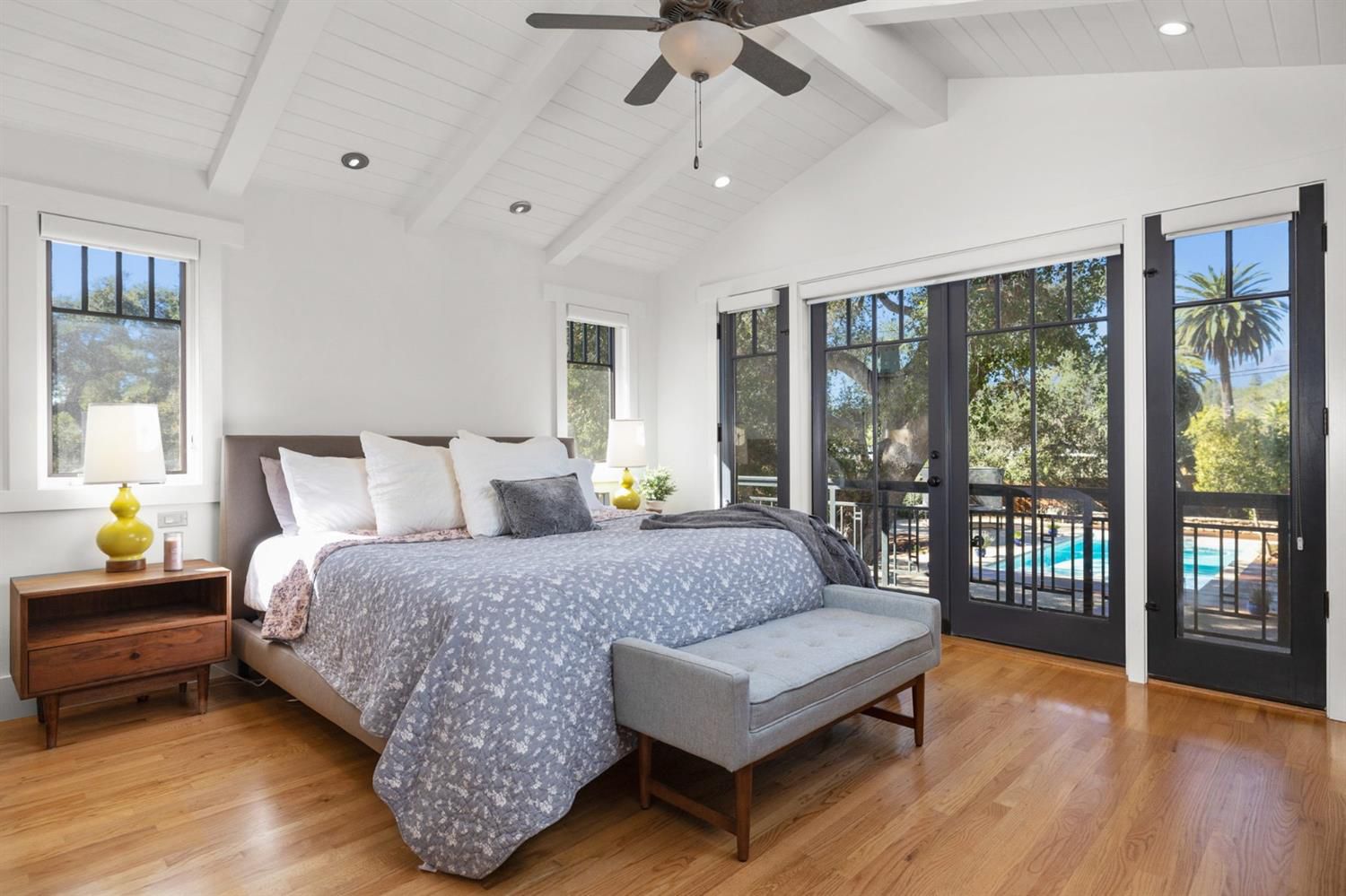810 El Toro Road Ojai, CA 93023 - Photo 18 of 50 a spacious bedroom with a bed and glass door