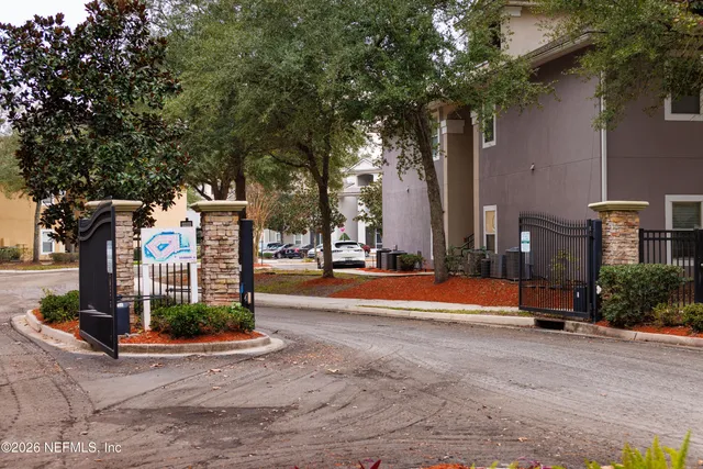 an aerial view of a house with swimming pool