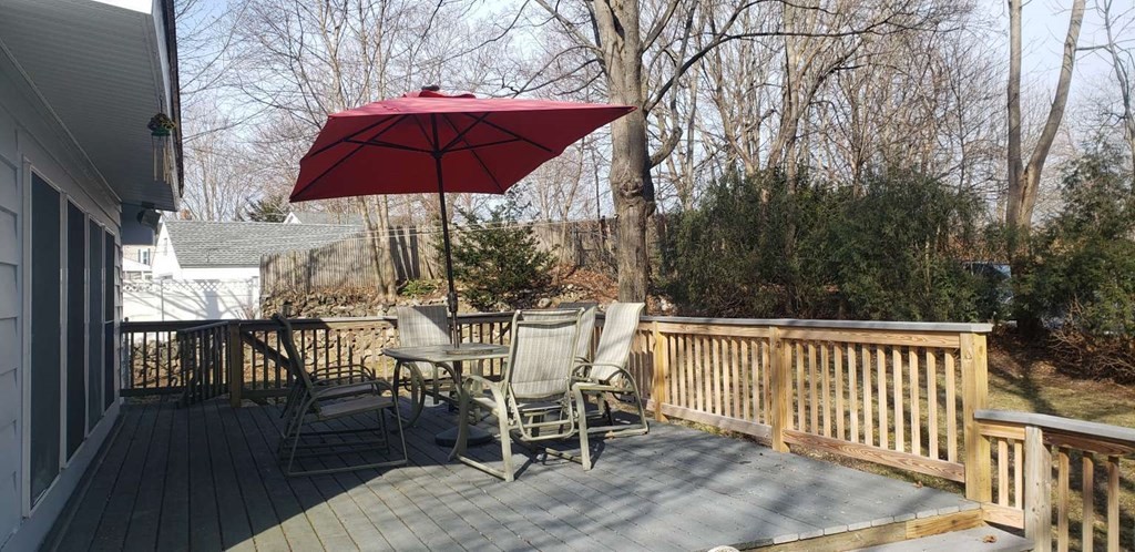 18 Davis Street Woburn, MA 01801 - Photo 19 of 20 a view of a chairs and table in the balcony