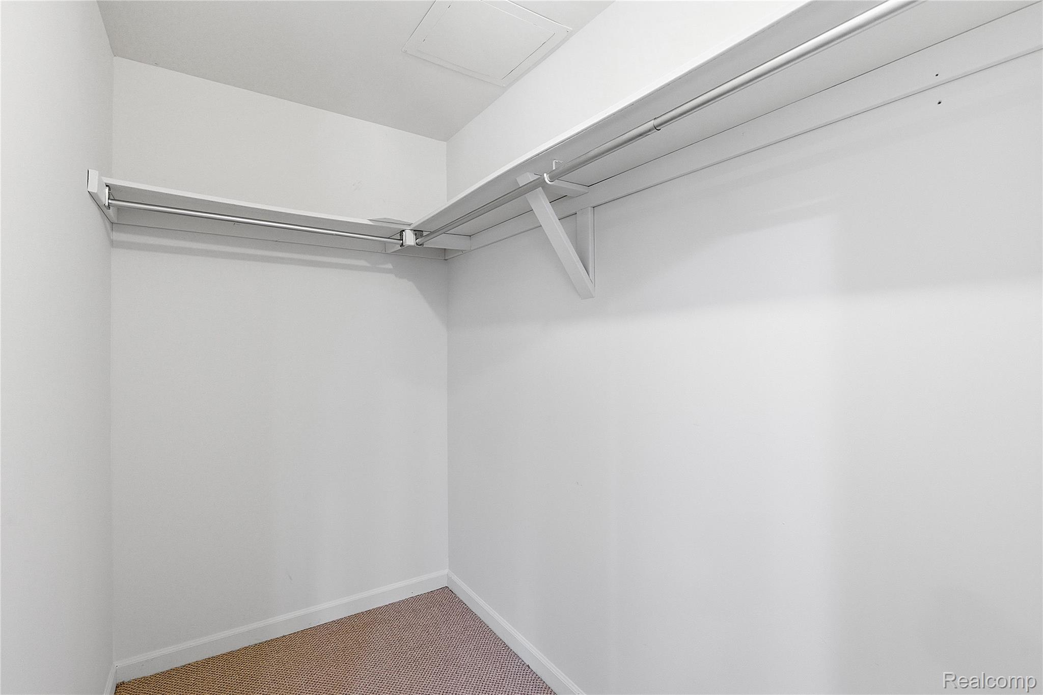 7154 Westchester Road West Bloomfield, MI 48322 - Photo 17 of 38 Spacious closet with carpet flooring