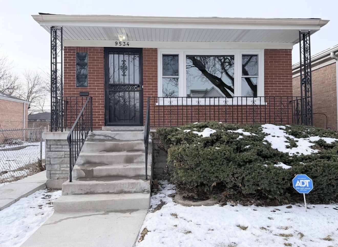 9534 South Yale Avenue Chicago, IL 60628 - Photo 1 of 26 a front view of a house