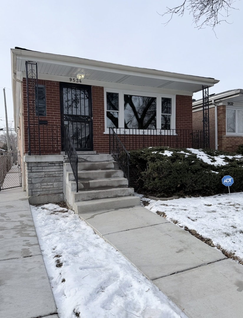 9534 South Yale Avenue Chicago, IL 60628 - Photo 2 of 26 a view of entryway in front of house
