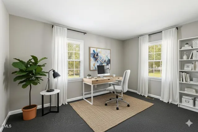 a work room with furniture potted plant and window