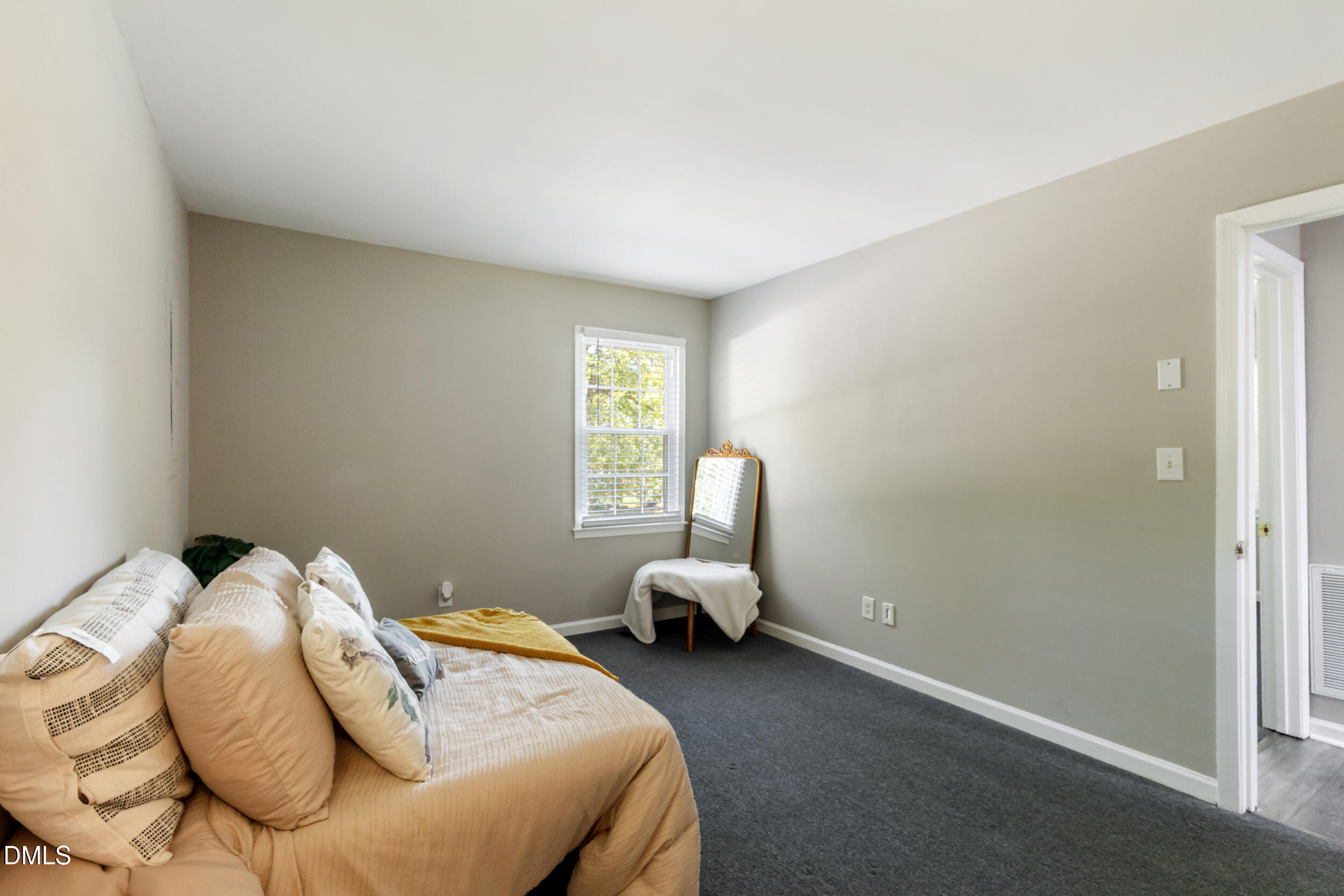 2400 Keith Drive Raleigh, NC 27610 - Photo 21 of 35 a bedroom with a bed and a window