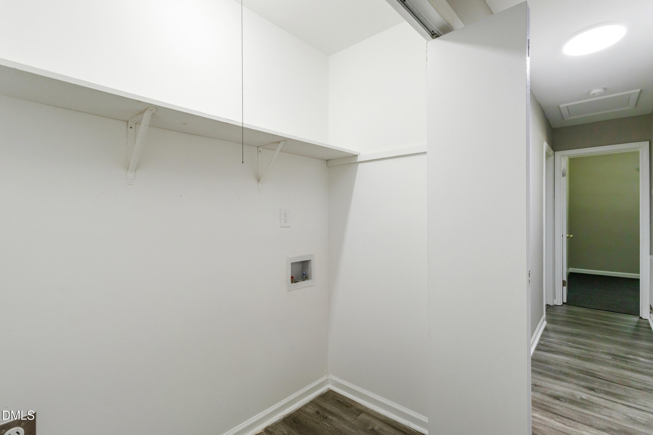 2400 Keith Drive Raleigh, NC 27610 - Photo 24 of 35 a view of a hallway with wooden floor