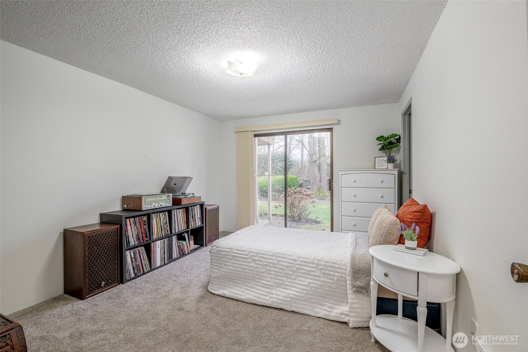 8521 South 259th Street, Unit B15 Kent, WA 98030 - Photo 15 of 24 a bedroom with a bed and a window