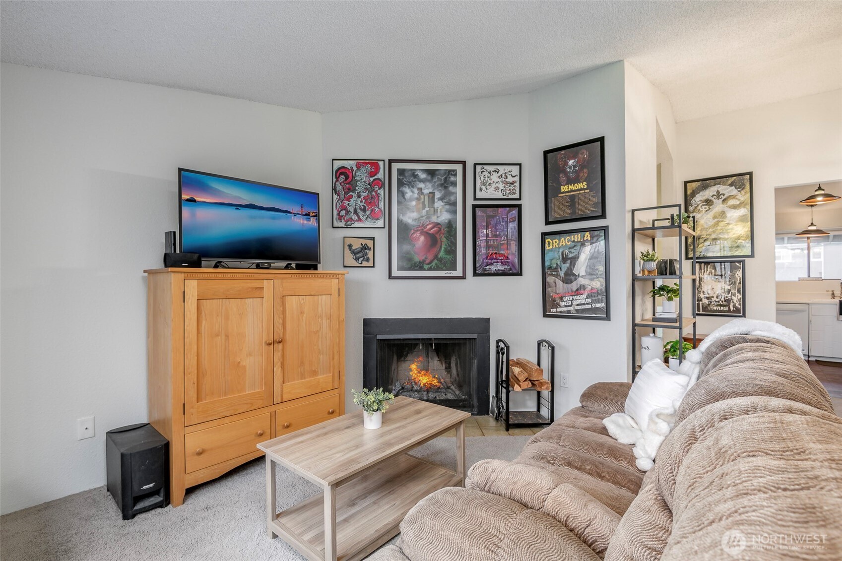 8521 South 259th Street, Unit B15 Kent, WA 98030 - Photo 4 of 24 a living room with furniture and a fireplace