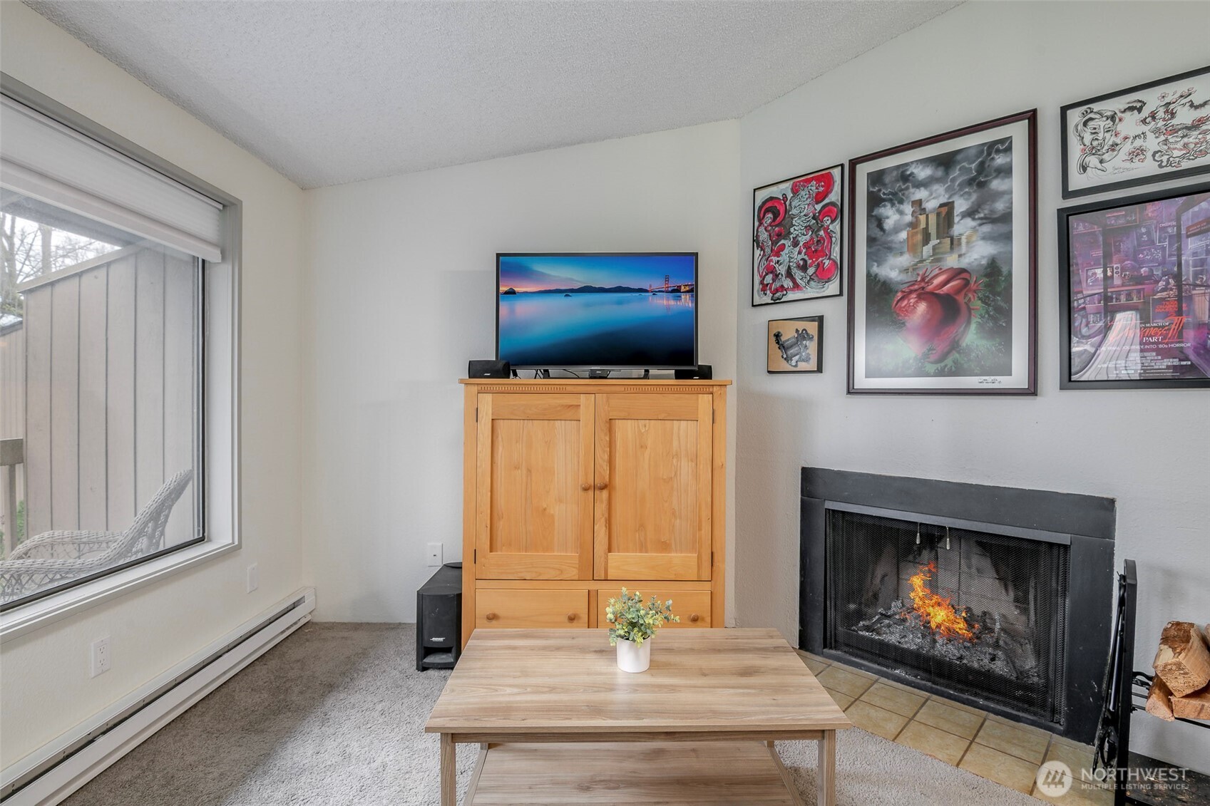 8521 South 259th Street, Unit B15 Kent, WA 98030 - Photo 5 of 24 a living room with furniture and a fireplace