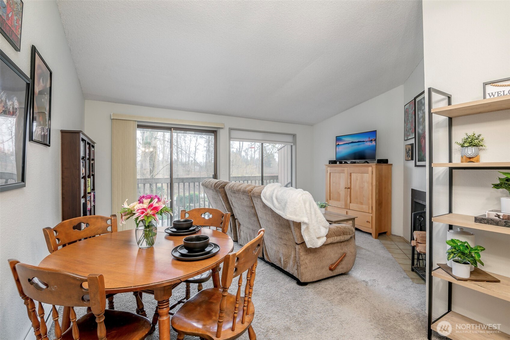 8521 South 259th Street, Unit B15 Kent, WA 98030 - Photo 7 of 24 a living room with furniture and a large window