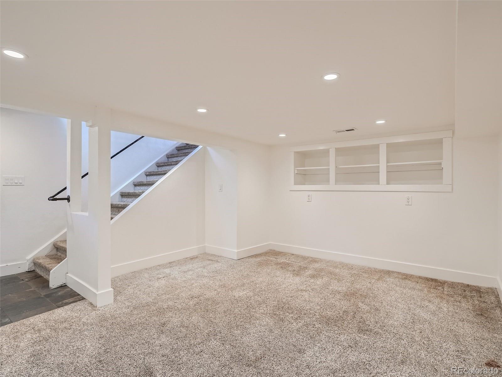 11799 Ranch Elsie Road Golden, CO 80403 - Photo 18 of 28 a view of an empty room with a window