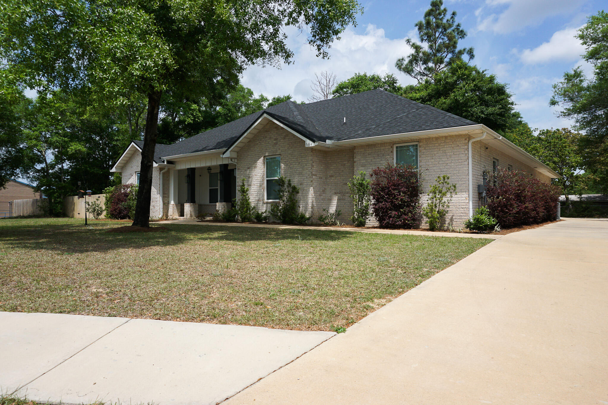 5464 Jenee Court Crestview, FL 32539 - Photo 2 of 63 a front view of a house with a yard