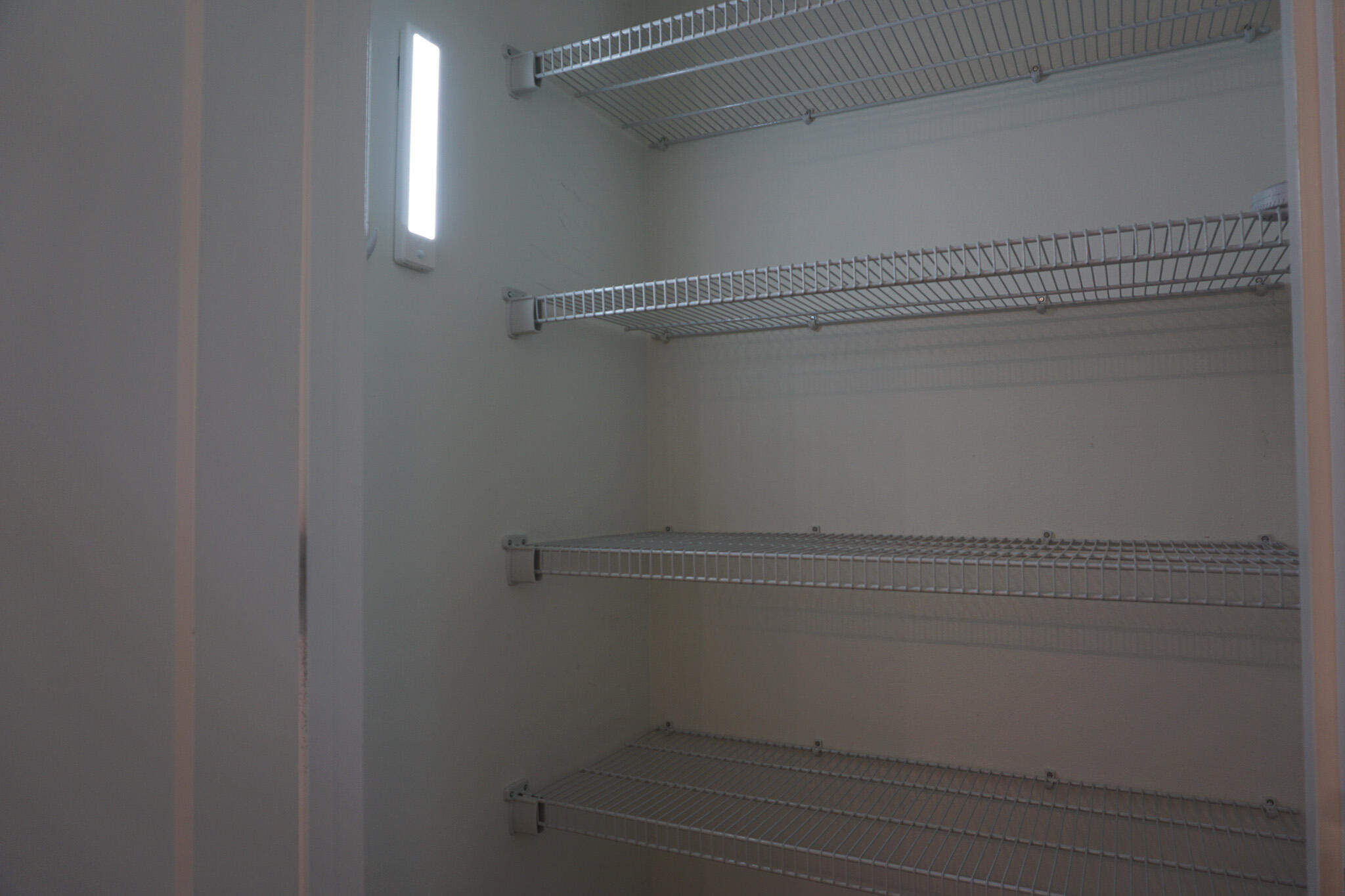 5464 Jenee Court Crestview, FL 32539 - Photo 23 of 63 a view of small space with racks on the wall