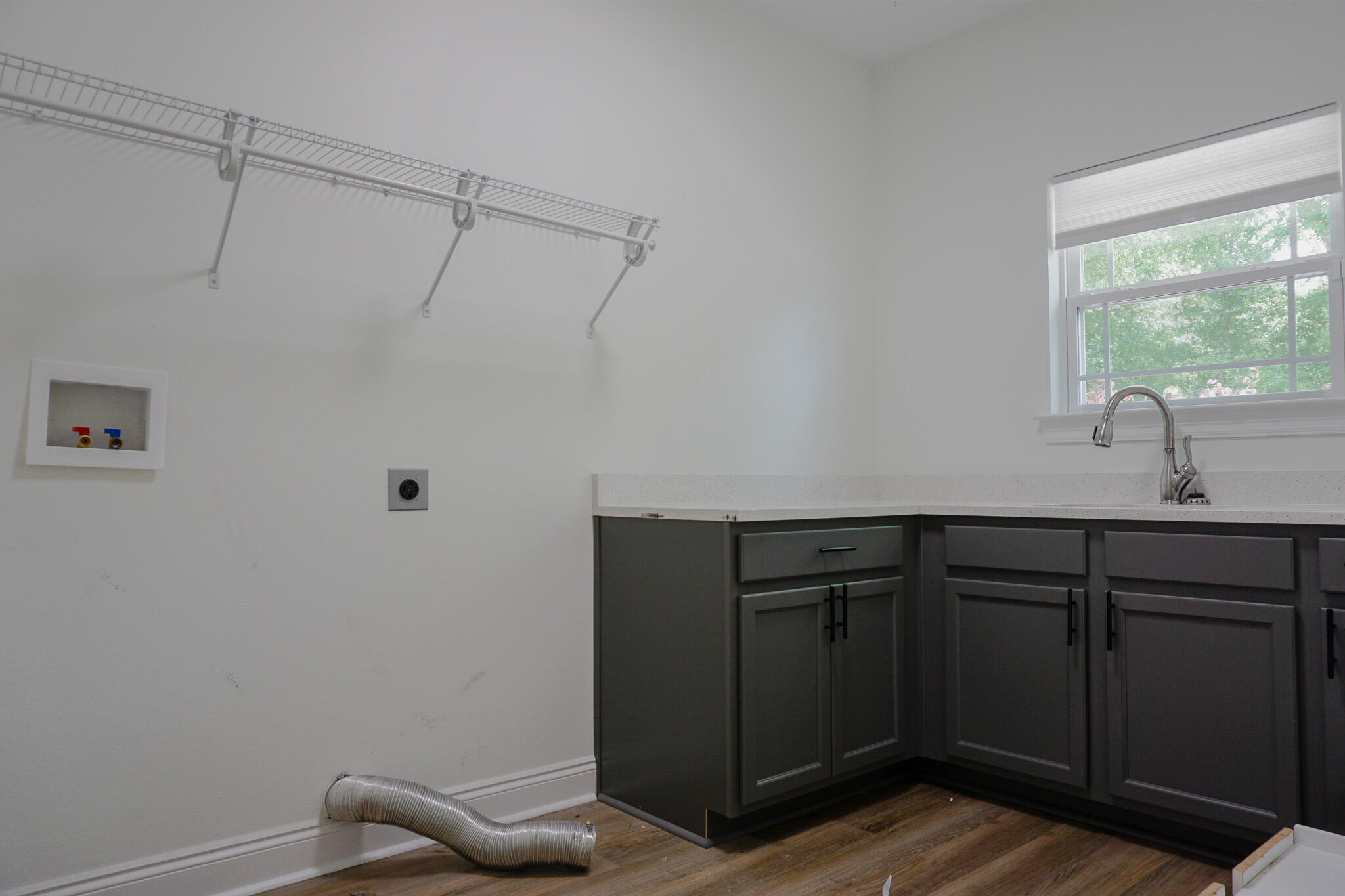 5464 Jenee Court Crestview, FL 32539 - Photo 26 of 63 a view of a closet area with wooden floor