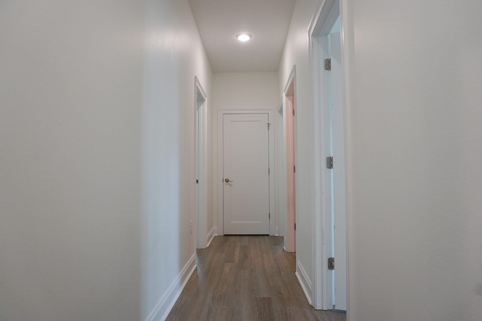 5464 Jenee Court Crestview, FL 32539 - Photo 28 of 63 a view of hallway with wooden floor