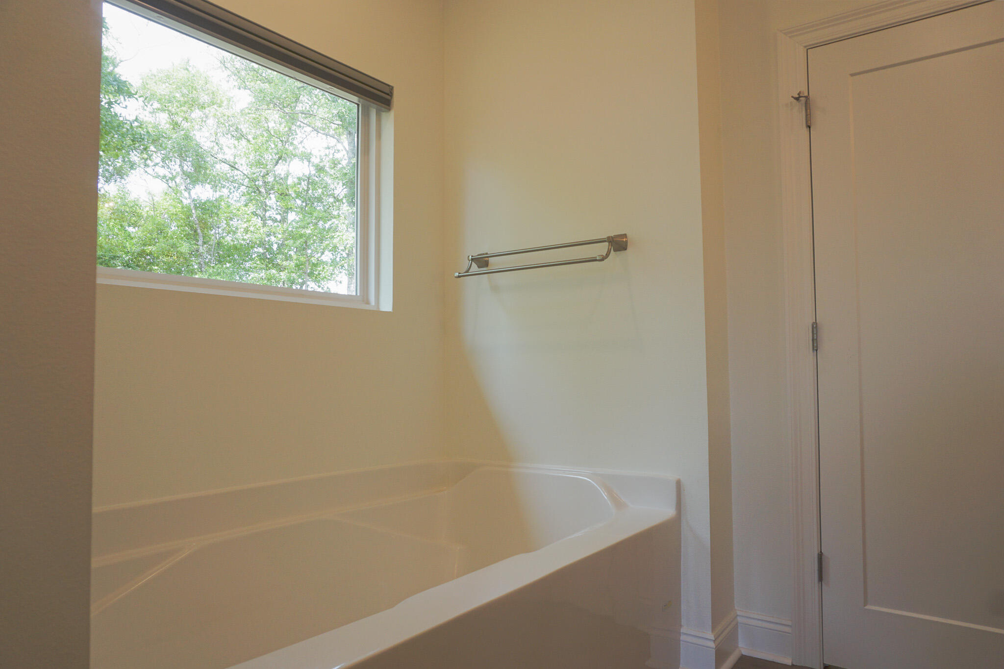 5464 Jenee Court Crestview, FL 32539 - Photo 47 of 63 a bath tub sitting next to a window