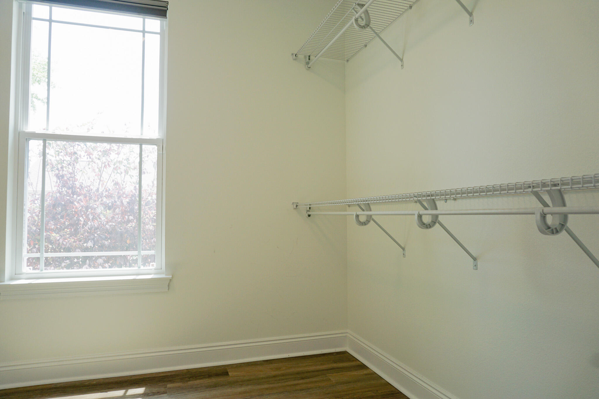 5464 Jenee Court Crestview, FL 32539 - Photo 51 of 63 a view of a room with racks on the wall