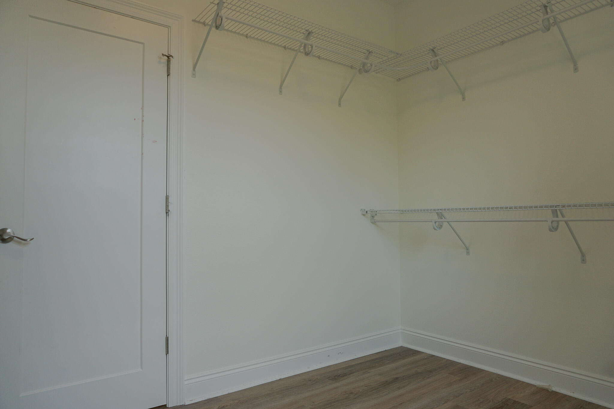 5464 Jenee Court Crestview, FL 32539 - Photo 53 of 63 a view of a room with racks on the wall