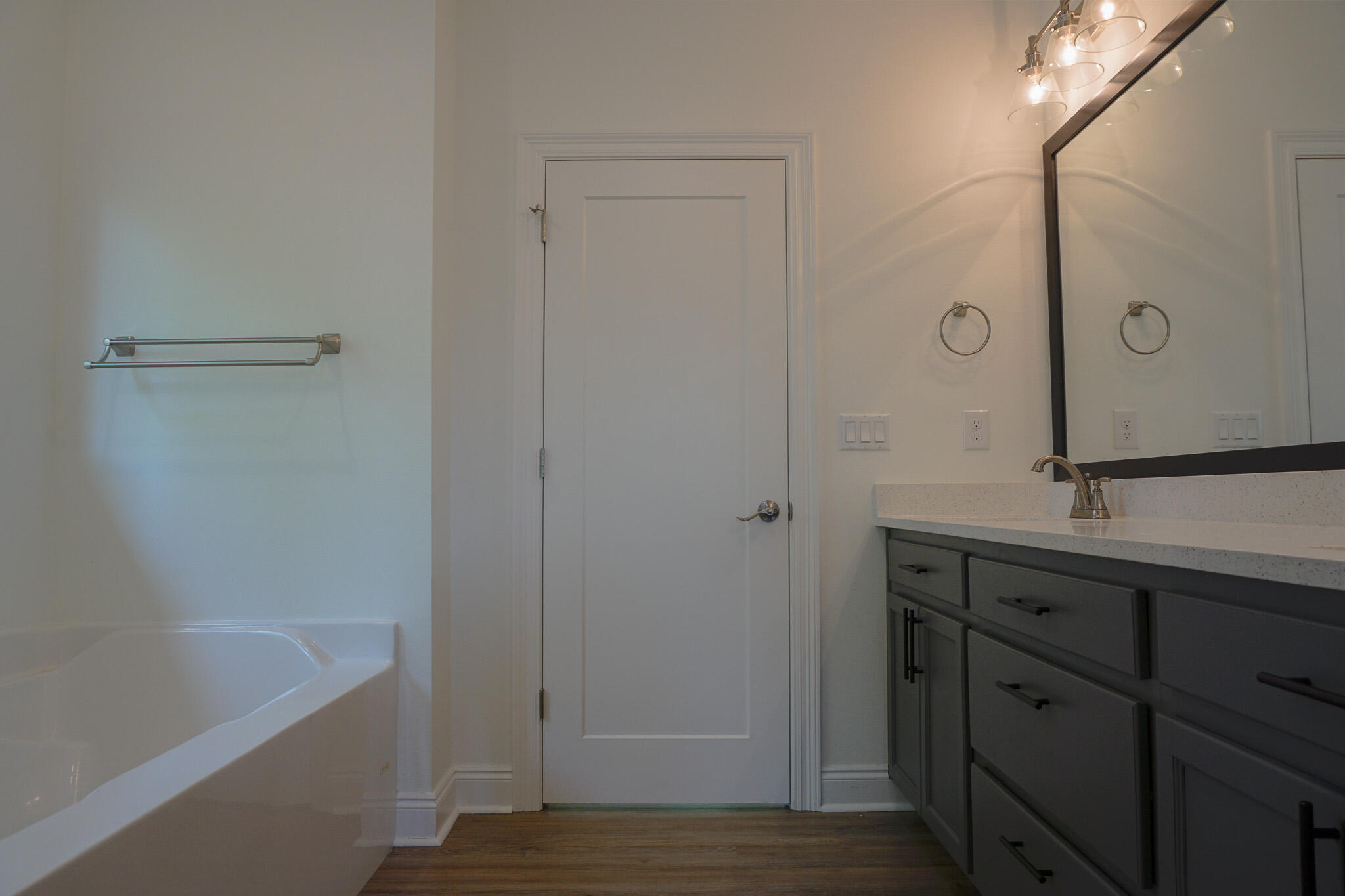 5464 Jenee Court Crestview, FL 32539 - Photo 54 of 63 a bathroom with a tub shower vanity and sink