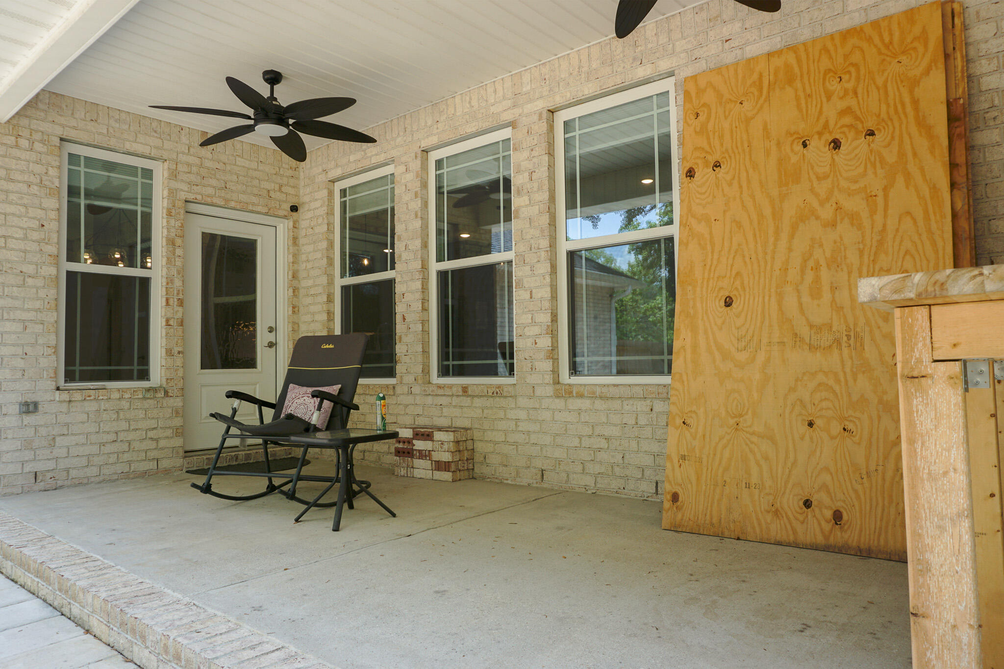 5464 Jenee Court Crestview, FL 32539 - Photo 57 of 63 a view of a entryway door with dining room and wooden door