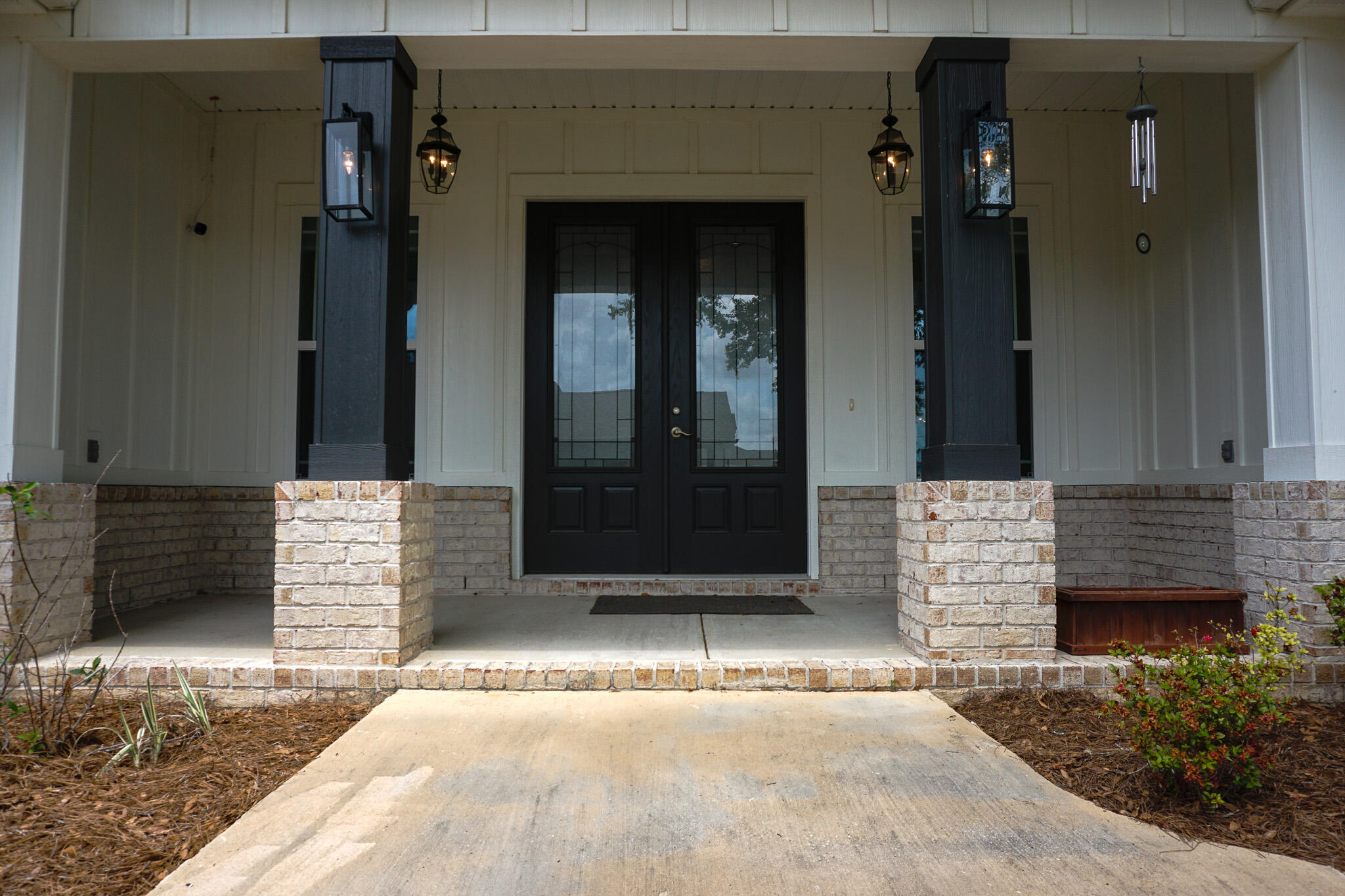 5464 Jenee Court Crestview, FL 32539 - Photo 6 of 63 a front view of a house with a garden